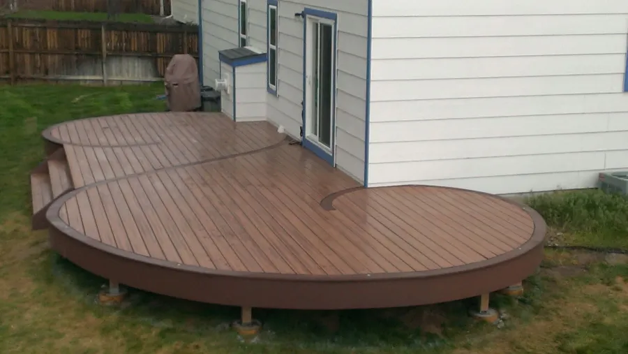 Custom Decks curved boards golden mean ratio trex decking spiced rum with trex vintage lantern accent aurora colorado