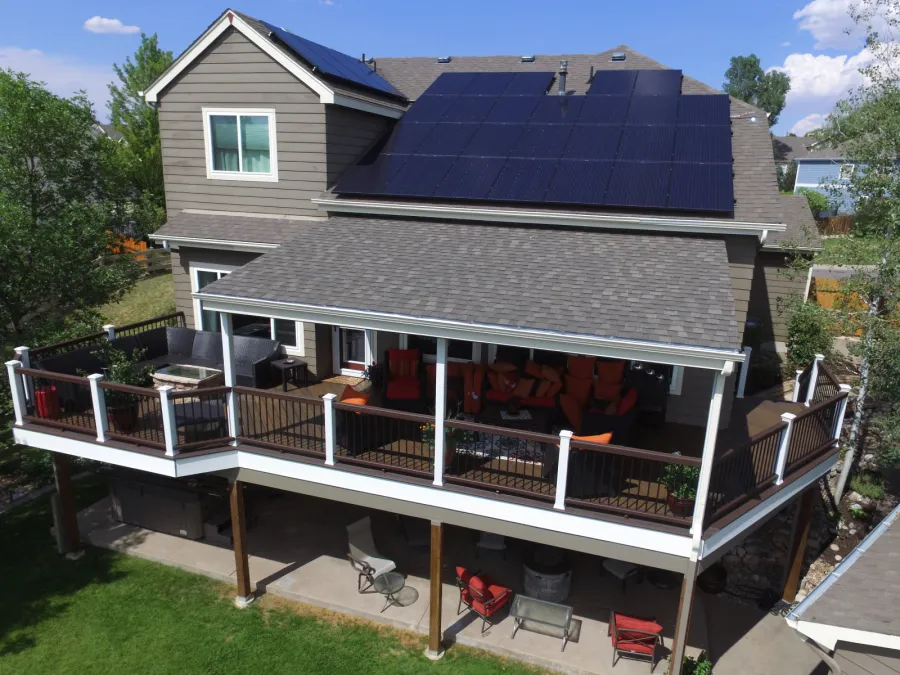 Custom Decks trex spiced rum decking vintage lantern border white fascia trex rail transcent white posts patio cover fire pit aurora colorado