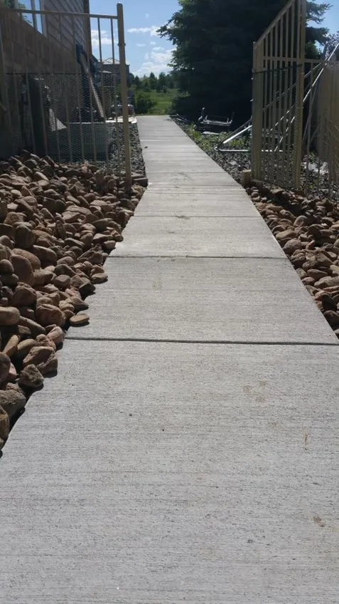 Custom Decks colored broom finish concrete path castle rock colorado Custom Decks colored broom finish concrete path castle rock colorado