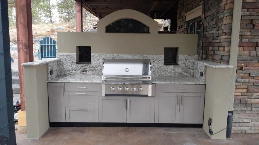 Custom Decks custom kitchen stucco with trex cabinets cutouts for seasoning refrigirated drawer Parker Colorado