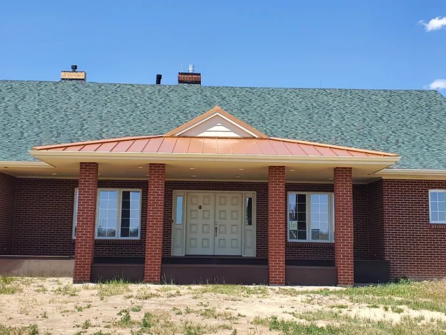 Custom Decks dutch gable patio cover copper standing seam roof green shingles Parker Colorado removed