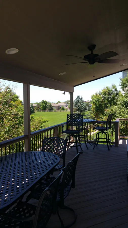 Custom Decks shed roof standard white soffit wrapped posts white fascia four can lights aurora colorado
