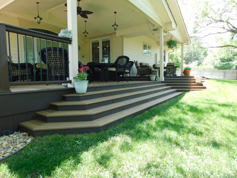 Custom Decks wrap around stairs trex havana gold treads trex spiced rum riser lights Littleton Colorado Custom Decks wrap around stairs trex havana gold treads trex spiced rum riser lights Littleton Colorado