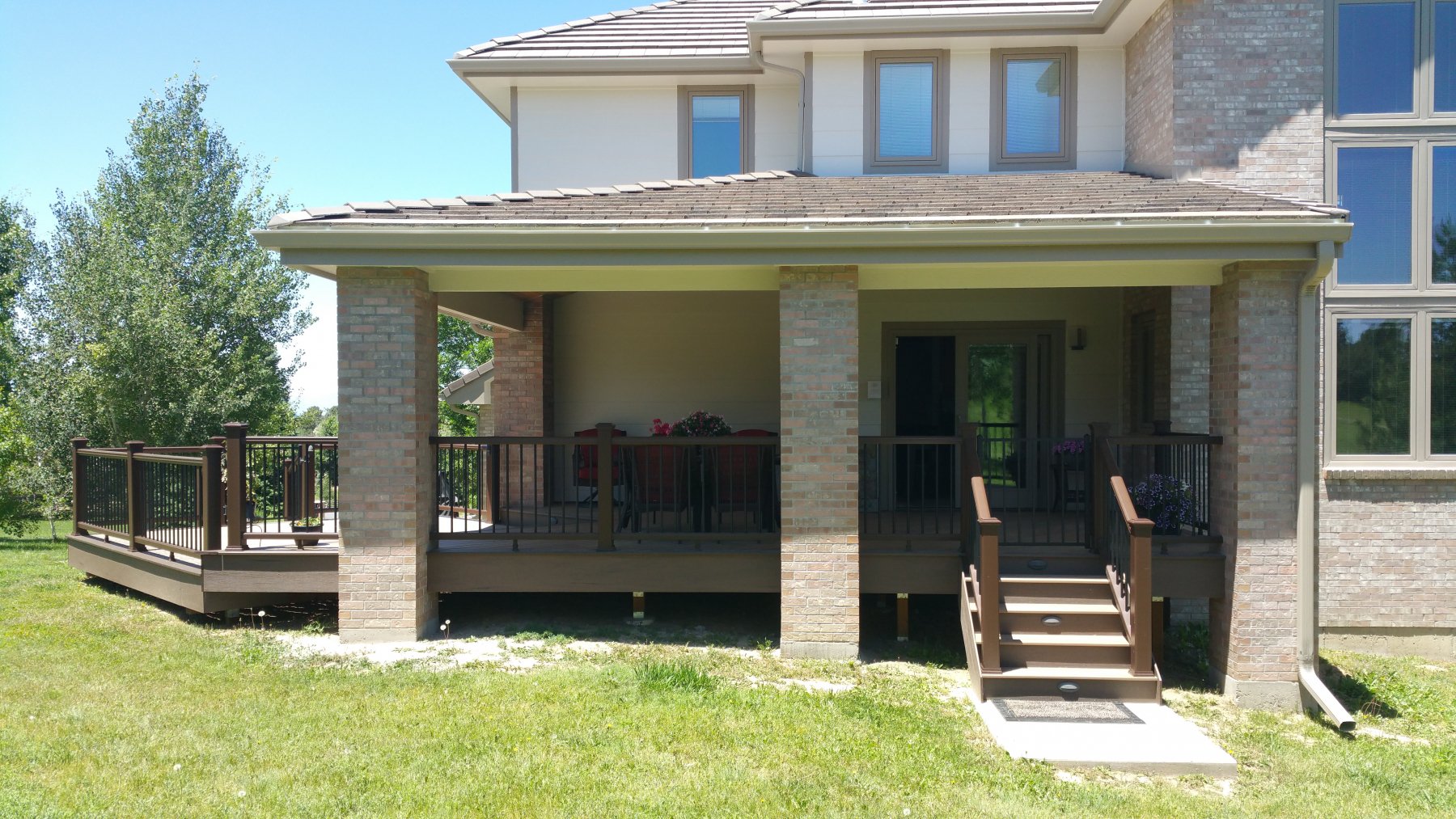 Custom Decks Hip Roof Patio Cover Posts Wrapped In Brick Can Lights Foxfield Colorado